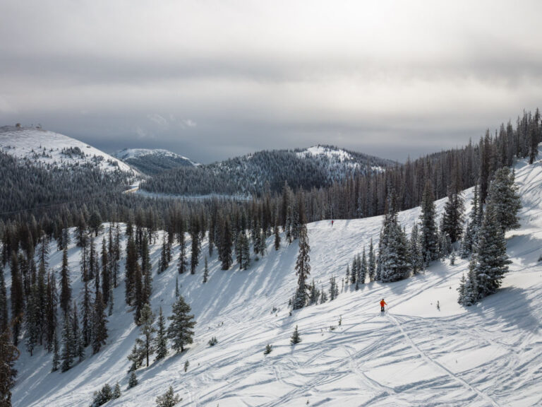Monarch Mountain skiing with Monarch Pass Colorado in the background