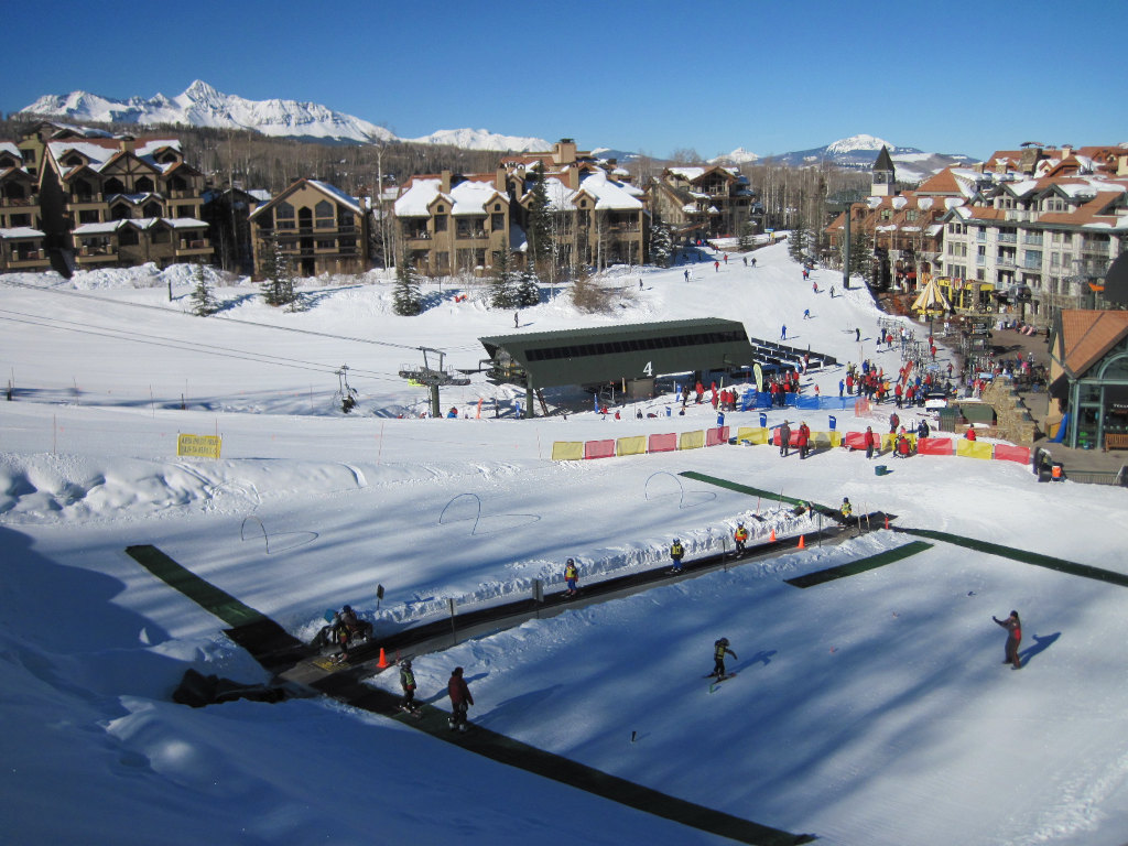 children learning to ski on magic carpet lift in Telluride