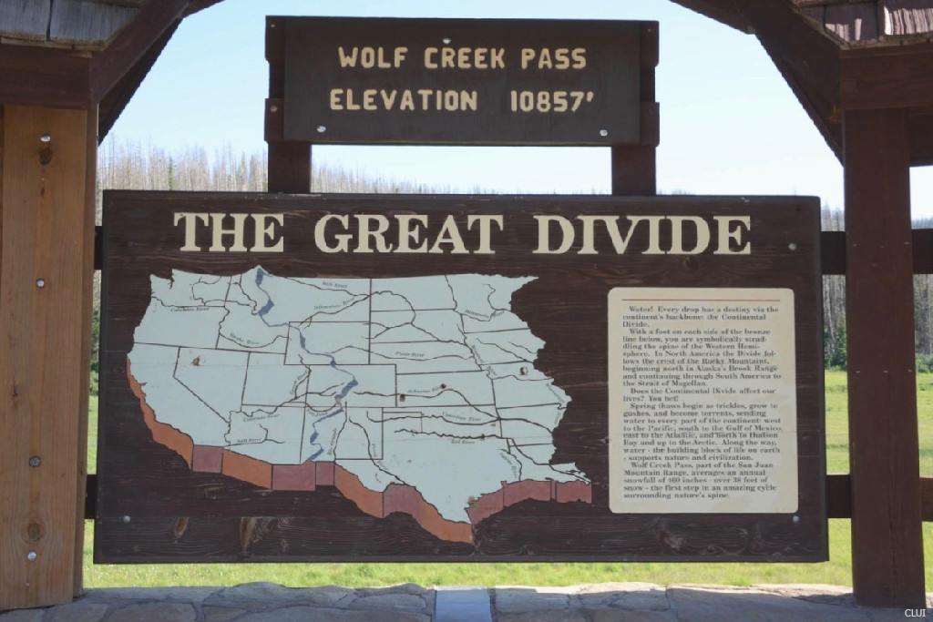 middle wooden sign for elevation of Wolf Creek Pass at the top of the pass