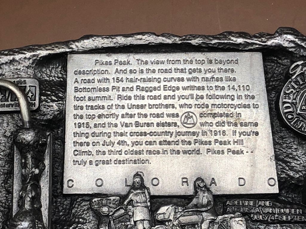 backside engraving inscription of 1996 Pikes Peak belt buckle celebrating the Van Buren sisters motorcycle ride across country up pikes peak