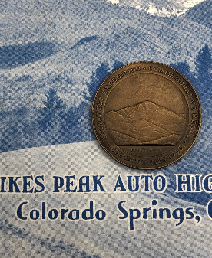 HK-338 Zebulon Pike Southwest Expedition Medal photographed on a brochure