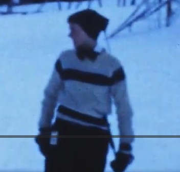 still frame from 1957 loveland ski area showing lift ticket in 1957