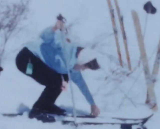 still frame from 1957 loveland ski area showing lift ticket in 1957
